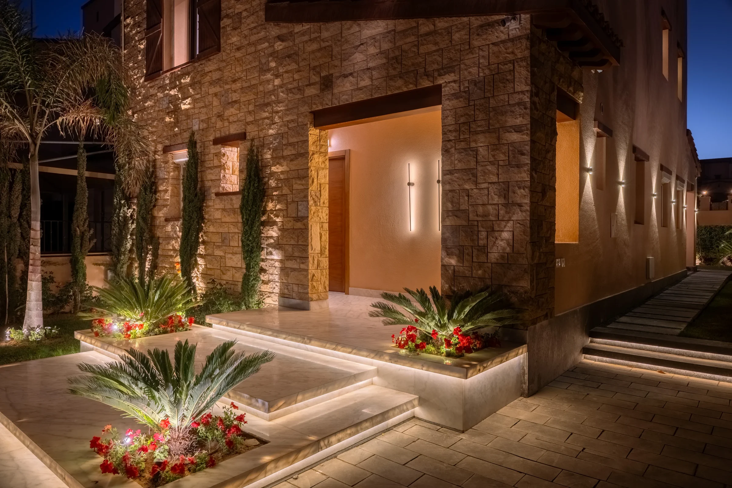 A Mivida villa entrance in New Cairo at night